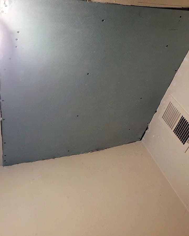 After: The same section of ceiling closed with new drywall